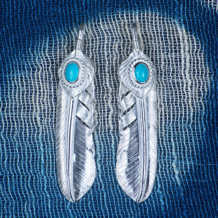 Turquoise Heart Life Feather, front view, turquoise set in a rope bezel